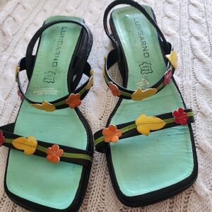 sandals  and colorful Italjan Leather  floral accents .New Condition